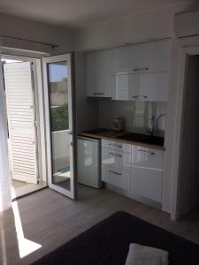 Studio apartment in Podgora with sea view, balcony, air conditioning, WiFi 4492-4