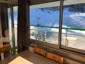 Appartements Le Skidoux 2*, au pied des pistes, vue montagne : photos des chambres