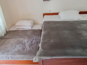 Penginapan Al Firdausi Syariah Mitra RedDoorz