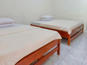 Penginapan Al Firdausi Syariah Mitra RedDoorz