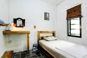 Phòng Đơn Với Phòng Tắm Chung (Single Room with Shared Bathroom)