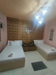 DJCI Apartelle Walk to Robinson & NE Pacific Mall 3 Min to SM Cabanatuan