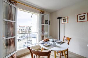 Appartements Sur l'ilot, au centre du port, vue UNIQUE ! : photos des chambres