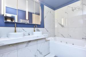 Appartements luxury Paris La Vie En Rose jacuzzi terrasse Parking : photos des chambres