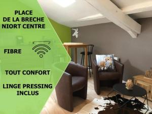 Appartements La Cabane centre la Breche wifi calme linge de pressing : photos des chambres