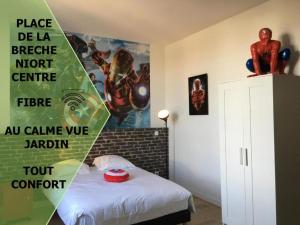 Appartements Le Marvel centre la Breche wifi vue jardin : photos des chambres