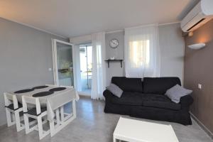 Appartements LES CIGALES de LA MER - CENTRE VILLE : photos des chambres