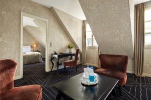 Hotels Le Pavillon de la Reine & Spa : photos des chambres