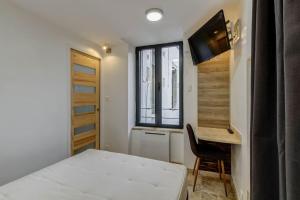 Appartements LA CACHETTE - TOPDESTINATION-DIJON - Centre ville - Classe 3 etoiles : photos des chambres