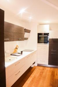 Appartements T3 au centre ville avec balcon, parking gratuit : photos des chambres