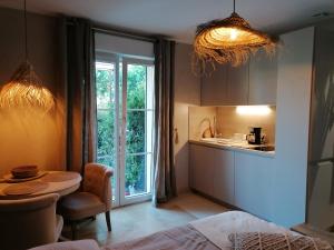 Appartements L'Autre Perle, balneo en supplement, le Clos des Perles : photos des chambres