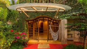 SaffronStays Birdsong - 3BR pet-friendly villa with lawns, treetop terraces, gazebo dining & tennis court