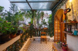 SaffronStays Birdsong - 3BR pet-friendly villa with lawns, treetop terraces, gazebo dining & tennis court