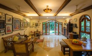 SaffronStays Birdsong - 3BR pet-friendly villa with lawns, treetop terraces, gazebo dining & tennis court