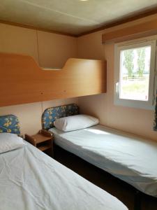 Maisons de vacances Camping Au Clos de Beaulieu : photos des chambres