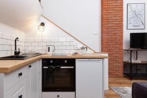 City Center Mezzanine Studio Chmielna by Renters