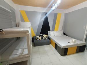 DJCI Apartelle Walk to Robinson & NE Pacific Mall 3 Min to SM Cabanatuan