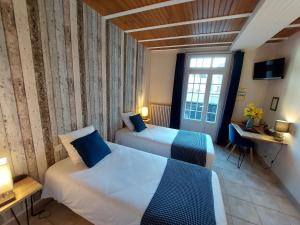 Hotels Logis Loire Hotel - Les Cocottes : photos des chambres