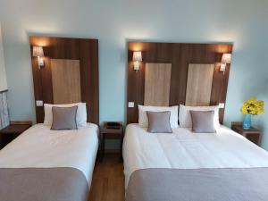 Hotels Logis Loire Hotel - Les Cocottes : photos des chambres