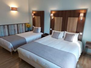 Hotels Logis Loire Hotel - Les Cocottes : photos des chambres