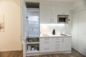 Almada Studios & Suites