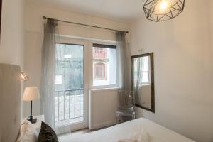 Almada Studios & Suites