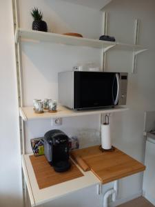 Studio avec terrasse en résidence calme à Dijon.