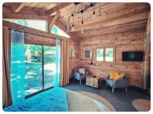 Chalets Chalet, bain nordique (spa) dans le triangle noir : photos des chambres