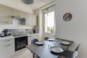 Appartements cosy cottage proche gare : photos des chambres