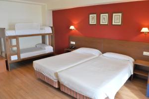 Quadruple Room (2 Adults + 2 Children) room in Hotel Candanchú