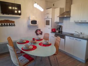 Appartements Le Lougo : photos des chambres