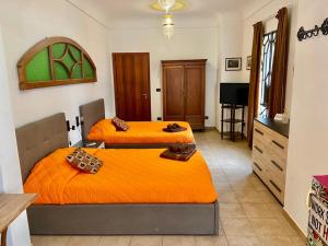Deluxe Queen Room with Two Queen Beds room in Casa di Marco
