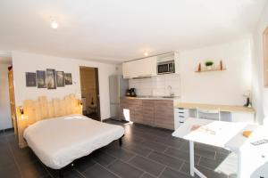 Appartements Studio 002 neuf proche gare TGV, A36 et Hopital : photos des chambres