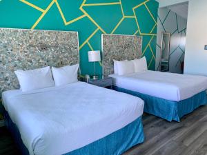 Superior Two Queen Beds with Fireplace room in Inn at East Beach
