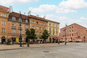Apartament przy Placu Zamkowym by Noclegi Renters