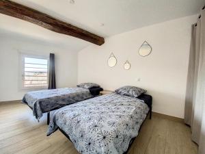 Appartements Le St Michel, T3 CLIM WIFI : photos des chambres