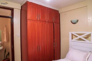 STYLISH 1BR APARTMENT IN KISUMU: FAST WI-FI, NETFLIX, SECURE PARKING