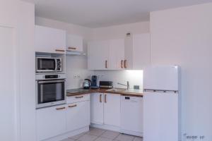 Appartements Le Clos Jaures/Lyon-Eurexpo/Parc OL : photos des chambres