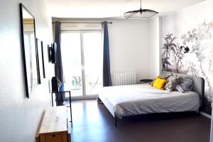 Appartements Studio Cosy Bordeaux - Parking prive - Netflix - Tram A : photos des chambres