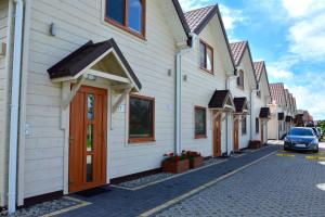 Piasek i Woda Drewniane Domki w Grzybowie - 3hvězdičkové hotely ve městě Grzybowo