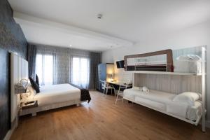 Quadruple Room (4 Adults) room in Petit Palace Savoy Alfonso XII