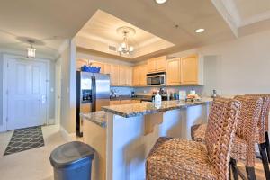 Sunny First-Floor Condo with Ocean-View Balcony!