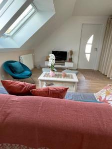 Appartements Appartement cosy sous les toits : photos des chambres