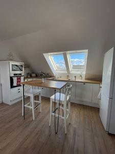 Appartement cosy sous les toits