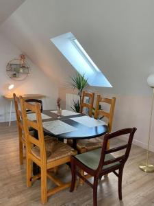 Appartements Appartement cosy sous les toits : photos des chambres