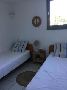 Maisons de vacances Villa Tim avec piscine commune et a deux pas de la plage : photos des chambres