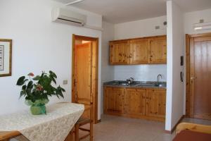 Two-Bedroom Apartment with Sea View room in Gardenia Casa Vacanze