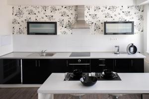 Moderný byt - výhľad na Martinské hole z najvyššieho poschodia budovy