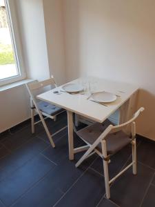 Appartements F2 101 neuf proche gare TGV, A36 et commerces : photos des chambres