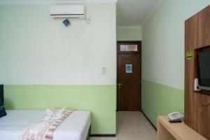 Urbanview Hotel de Kopen Malang by RedDoorz